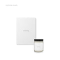 A candle and a journal, together