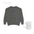 A sweater and a mug, together